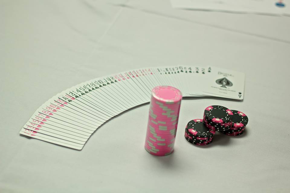 pink-poker-chips-and-cards
